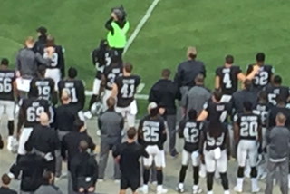 Raiders Carr and Mack hope to send message of unity and love