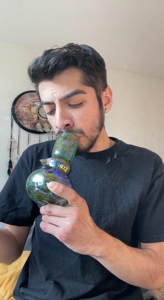 Smoking a blunt in a bong