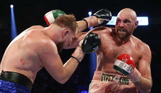 Tyson Fury survives being cut over his eye to outlast Otto Wallin