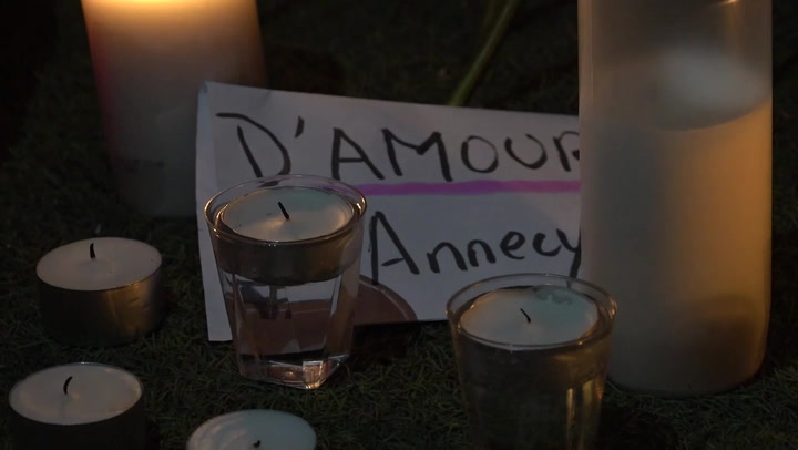 Flowers and toys laid in tribute at Annecy park after knifeman stabbed children and adults