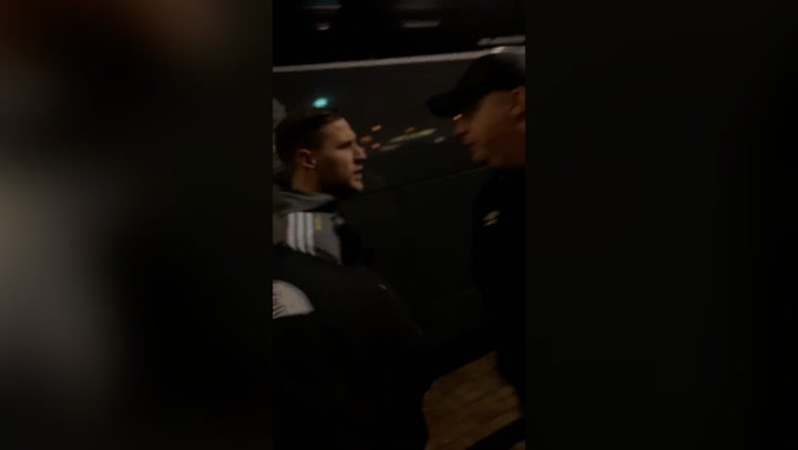 Sheffield United striker Billy Sharp argues with Derby fans outside ground