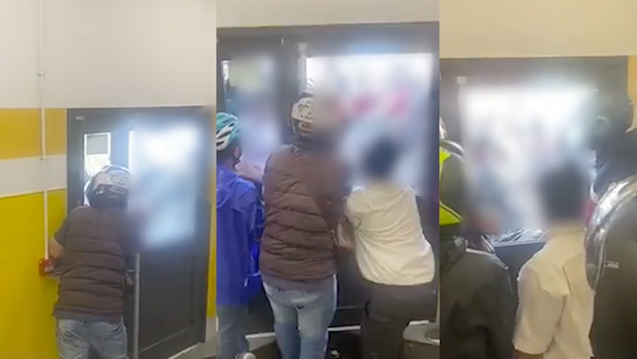 Man smashes in McDonald's door as delivery drivers help terrified staff ...