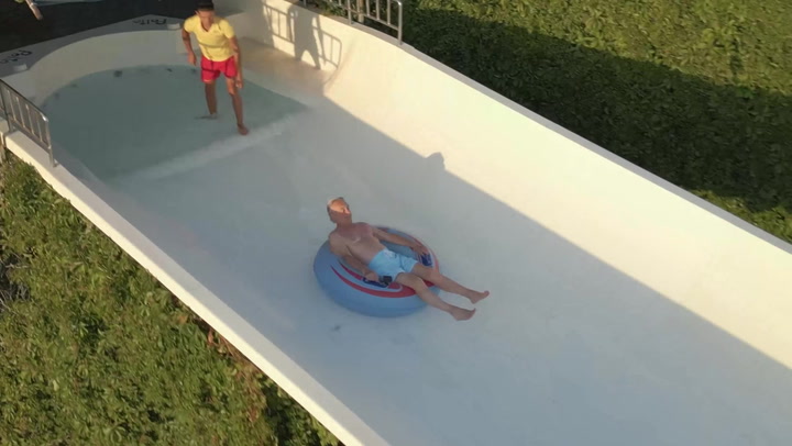 78-year-old daredevil enjoys first ever trip down a waterslide