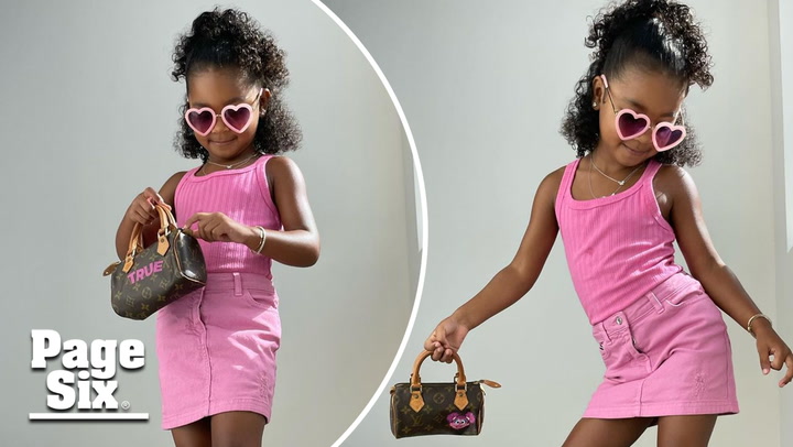True Thompson Models Louis Vuitton Bag & All-Pink Outfit