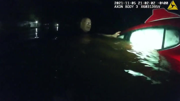 Florida police rescue woman trapped inside sinking vehicle