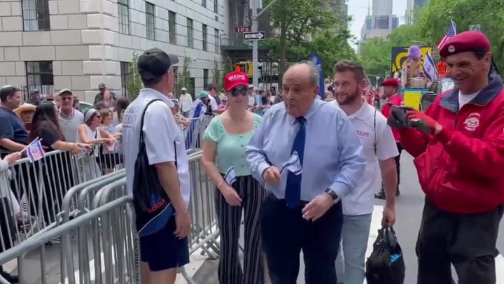 ‘As demented as Biden’: Rudy Giuliani shouts back at heckler during pro-Israel parade