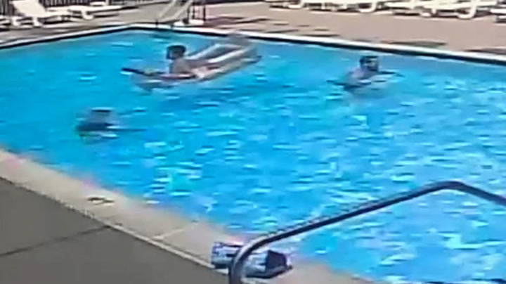 'Heroic' children save drowning seven-year-old as unaware adult swims past
