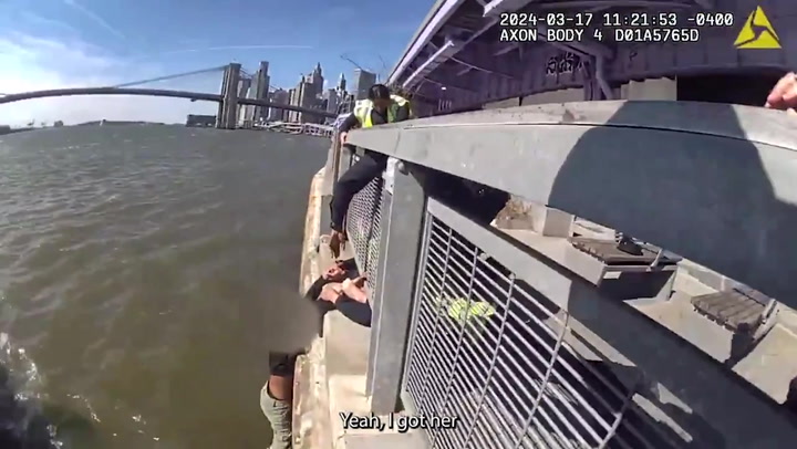 Woman attempting to jump into East River grabbed by NYPD officers