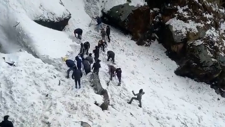 Avalanche sweeps away group of tourists in the Himalayas, killing at least seven