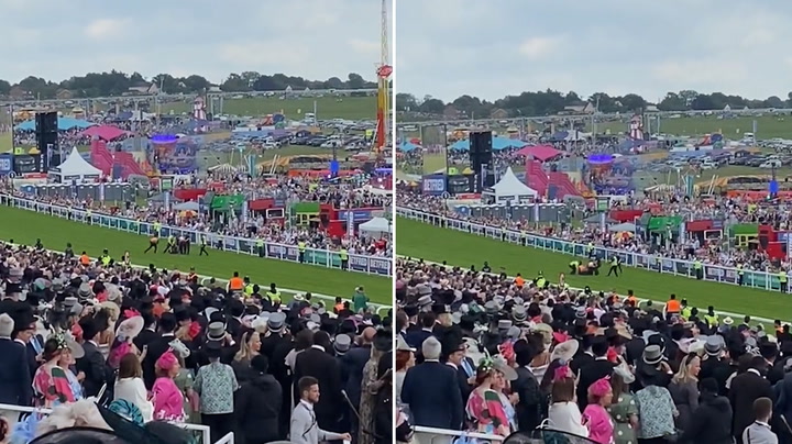 Protester dragged off Epsom Derby racecourse