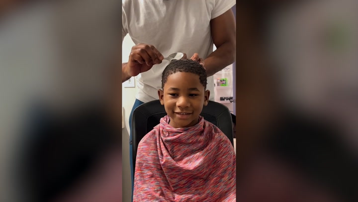 Father gives his son fresh haircut only using a spoon