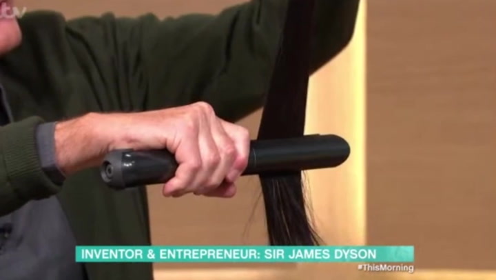 James Dyson pulls a handful of hair out of pocket for Dyson product demonstration