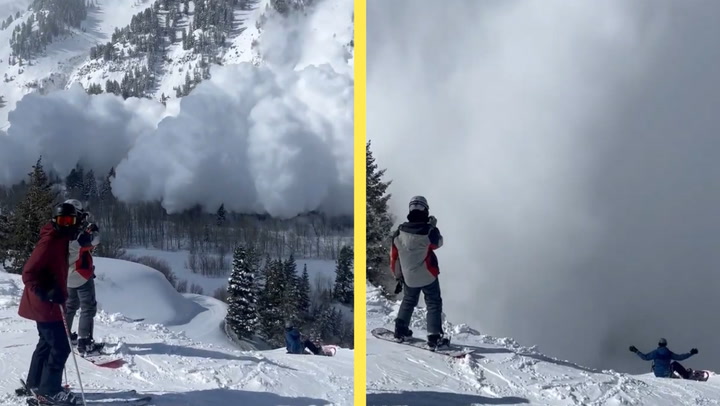 MASSIVE AVALANCHE RUSHES TOWARDS RESORT AS SKIERS WATCH IN AWE