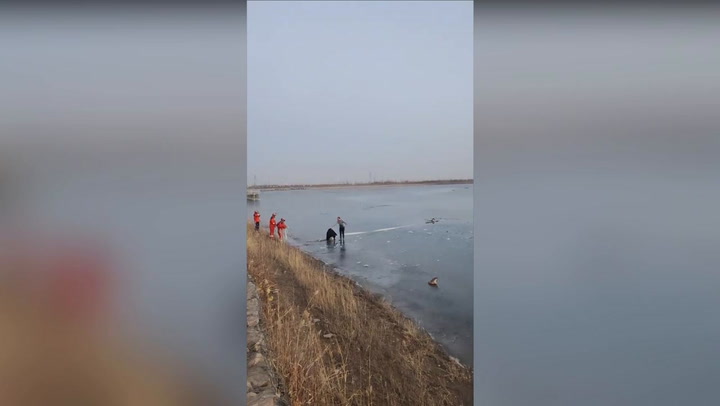 Firefighters and volunteers save two teen boys from frozen lake
