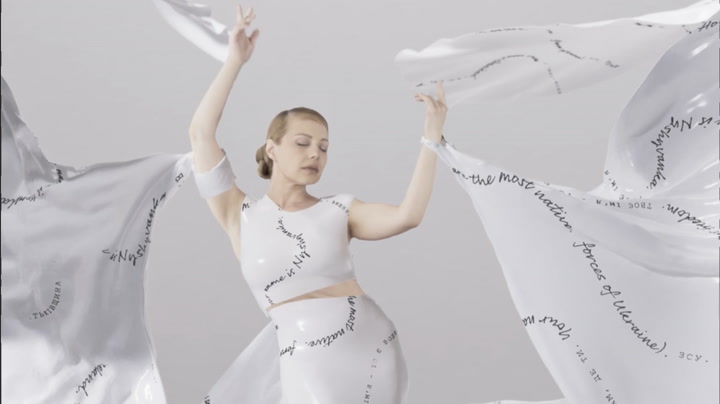 Ukrainian designer and British artists create 'love letter' dress to mark invasion anniversary