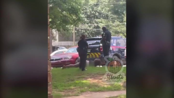 Video of Atlanta police kicking handcuffed woman in face leaves family ‘horrified’