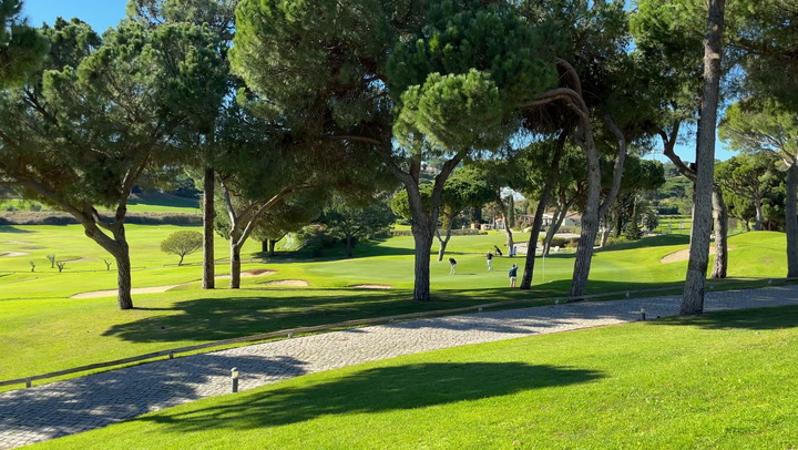 Playing on a golf course in the Algarve region 