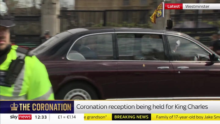 King arrives in Westminster for celebratory pre-coronation reception