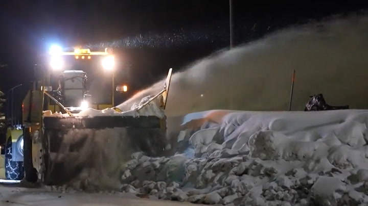 Snow removal continues as snow piles up in California