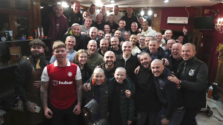 Entire Bristol Rovers squad shave their heads in support of teammate with cancer
