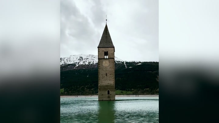 Italian village emerges from water for first time in 70 years as lake is drained