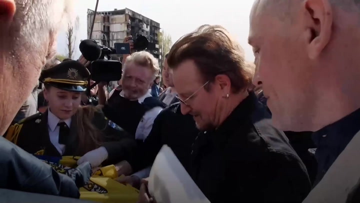 Bono and The Edge visit Borodyanka after performing in Kyiv bomb shelter