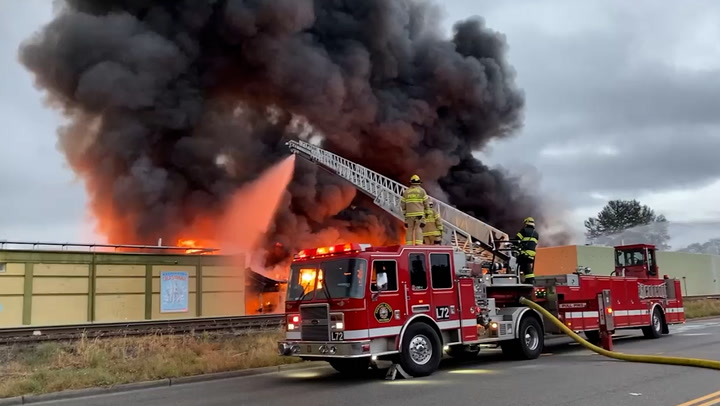 Firefighters battle huge blaze at Washington cold-storage warehouse