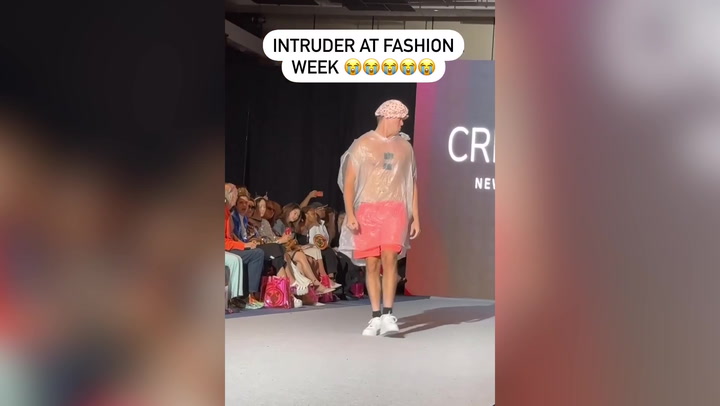 Intruder parades New York Fashion Week catwalk in shower cap - but no one realises