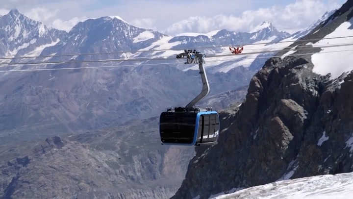 Stunning views over a glacier from new cable car linking Switzerland and Italy