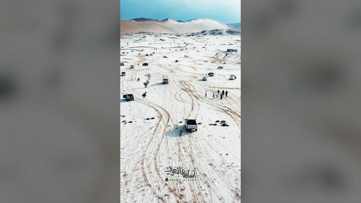 Saudi sand dunes covered in snow after rare hail storm