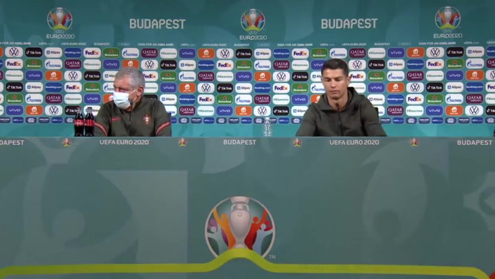 Cristiano Ronaldo removes coke bottles as press and says 'water!'