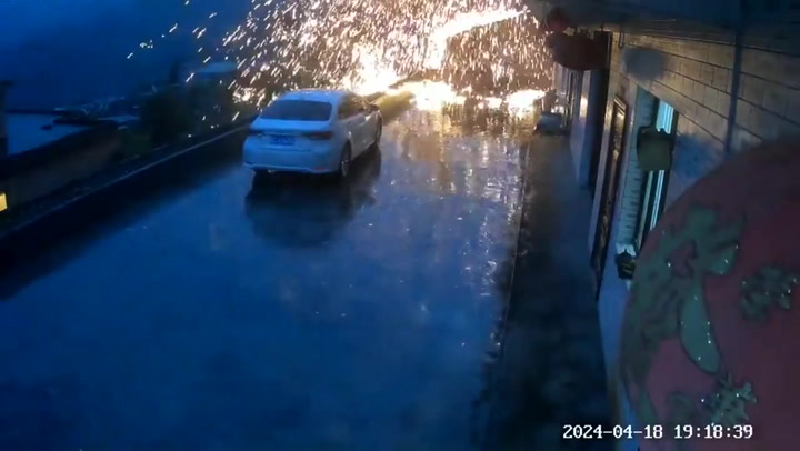 Watch: Shower of sparks as lightning strikes house roof during China storm