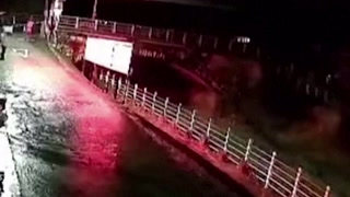 Bridge collapses into river in China during powerful floods