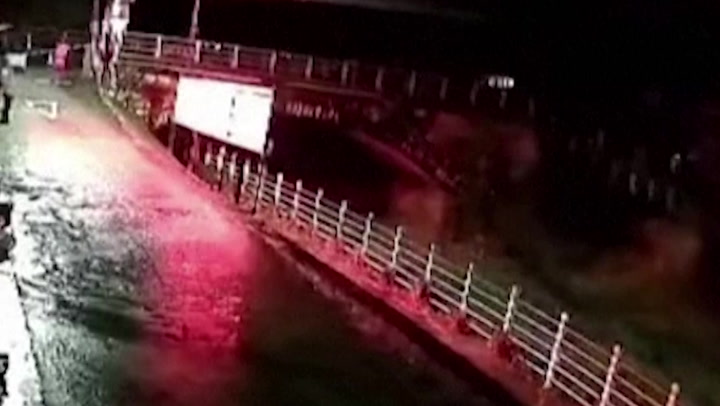 Bridge collapses in China during powerful floods