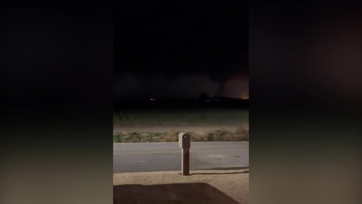 Deadly twin tornados illuminated by lightning seen in Arkansas