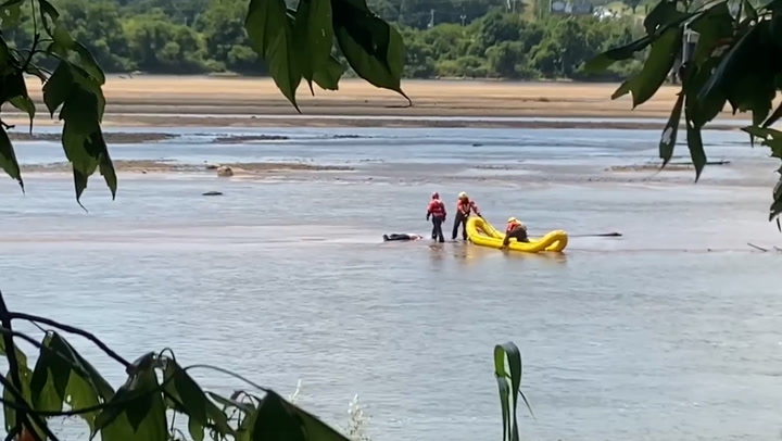 Man relaxing in river mistaken for dead body