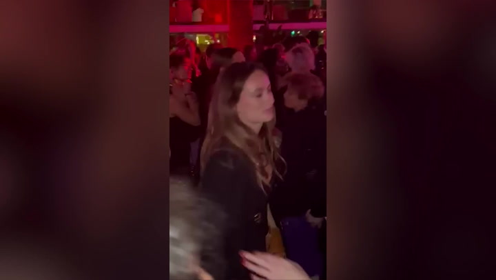 Don't Worry Darling director Olivia Wilde dances to Bruno Mars at Gucci afterparty
