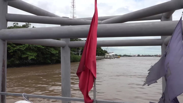 Bangkok river reaches dangerously high levels following heavy monsoon season rain