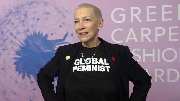 Annie Lennox wears 'Global feminist' shirt as she appears at Green Carpet Fashion Awards
