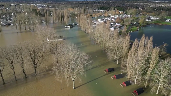 Storm Henk: Drone footage shows holiday homes submerged by water