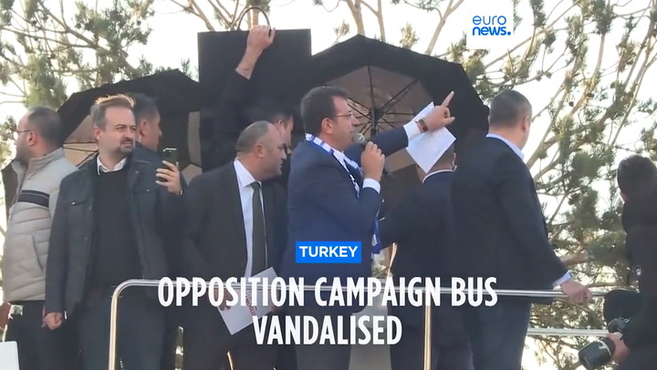 Protesters pelt Istanbul mayor's campaign bus with stones