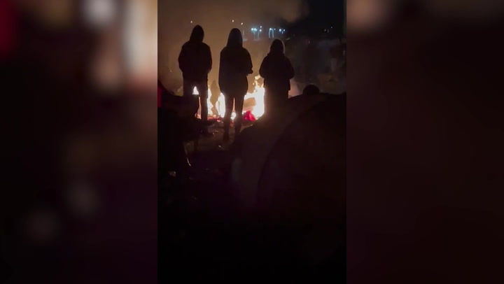 Fires burn at Reading Festival amid claims of poor security and safety