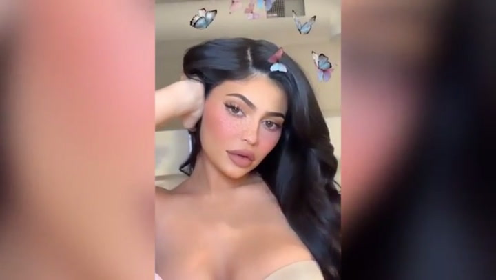 Kylie Jenner Grabs Boobs in Photos: Holding Breasts Pictures