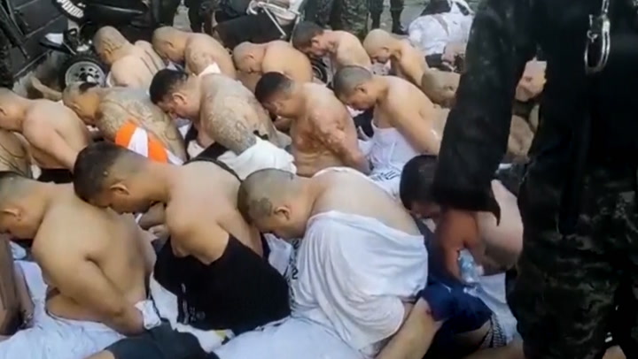 Honduras prison forces inmates to sit half-naked during search for contraband