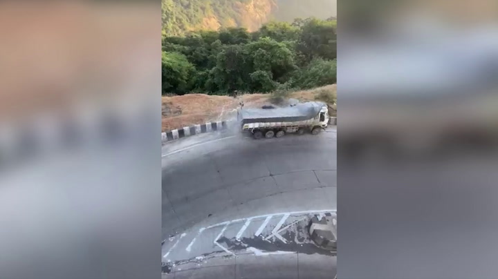 Moment cement truck speeds down mountain road after brakes fail