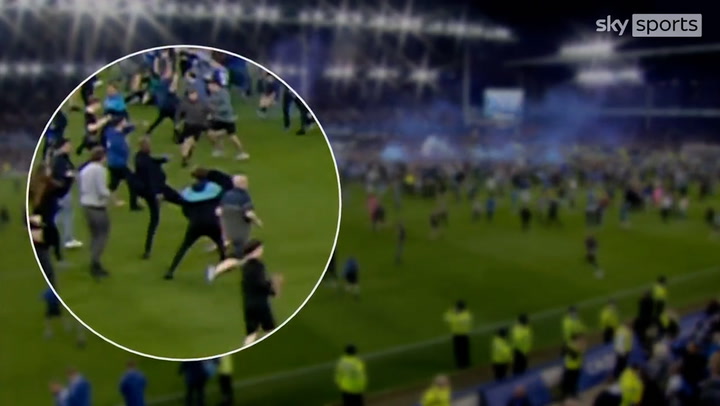 Patrick Vieira appears to kick Everton fan after being taunted during pitch invasion