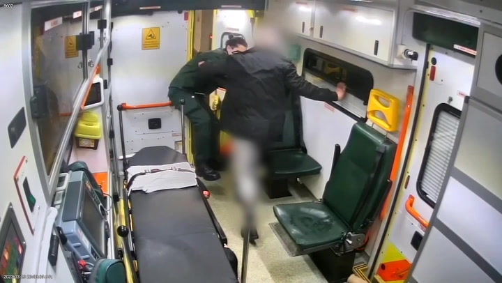 Abusive patient pushes paramedic out of ambulance