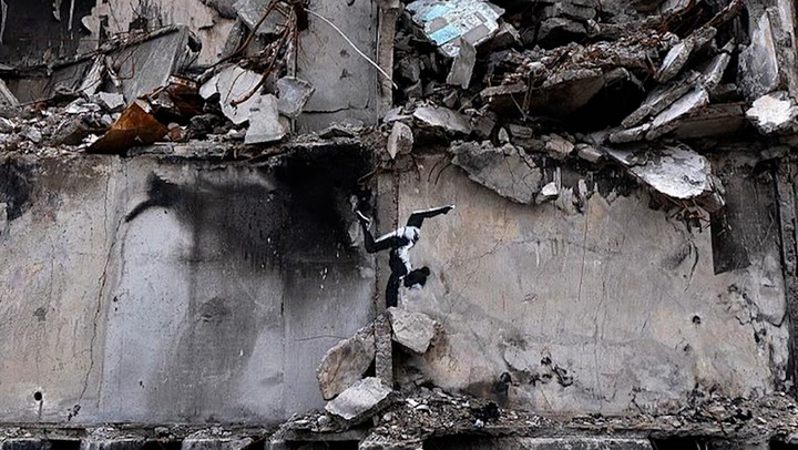 Banksy unveils new artwork on war-torn Ukrainian building