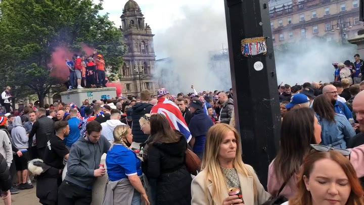 Rangers fans forced from Glasgow George Square after celebrating win