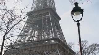 Tourists revel as snow blankets Eiffel Tower and other Paris monuments